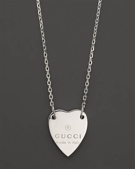 gucci engraved heart necklace.